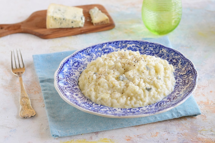 Risotto ai 4 formaggi: la ricetta del primo cremoso e saporito